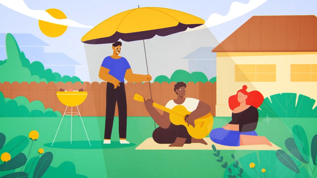 Animated video still showing a family  relaxing under an umbrella.