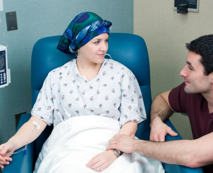 female cancer patient receiving chemotherapy treatment
