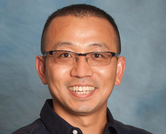 close up portrait of Mingfeng Bai, PhD from Vanderbilt University Medical Center (North Central)